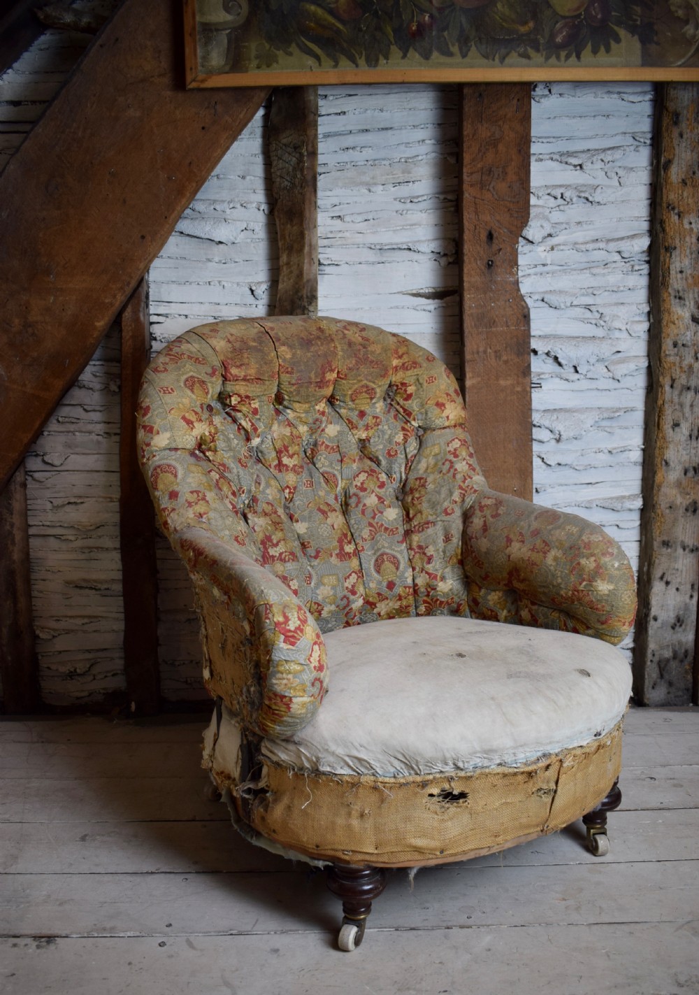 Victorian iron framed button back armchair with sprung seat, for re-covering