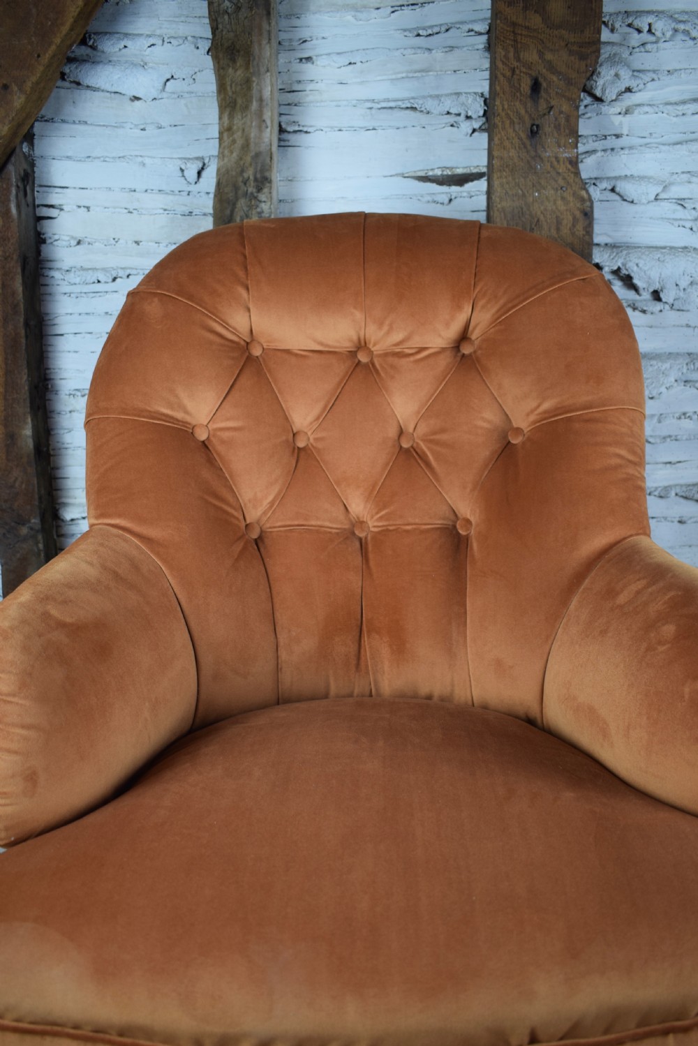 Antique button back armchair by Cornelius V Smith, newly upholstered in burnt orange velvet View V
