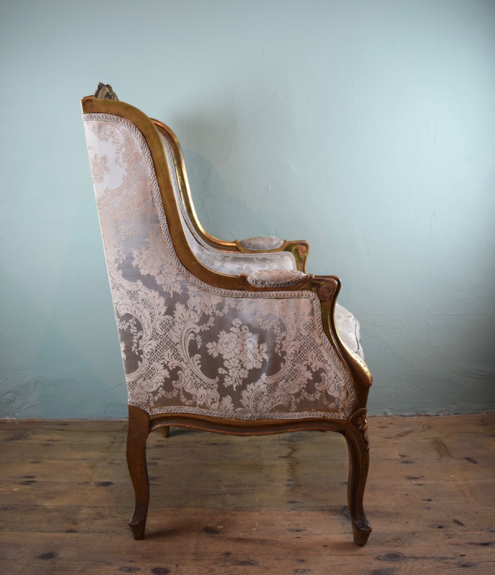 Antique French Carved Giltwood Wingback Chair in Louis XV Style View II