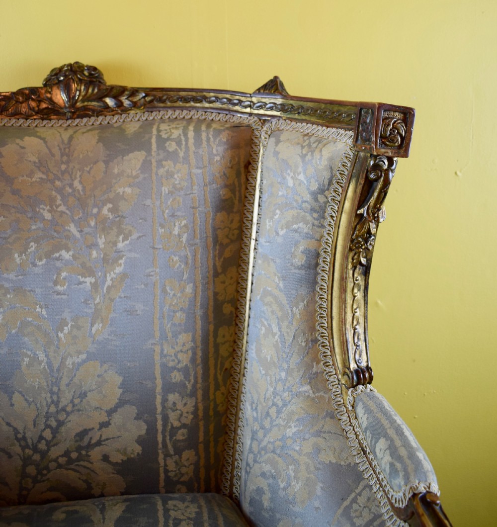 Antique French gilt wood wingback armchair in Louis XVI style View III