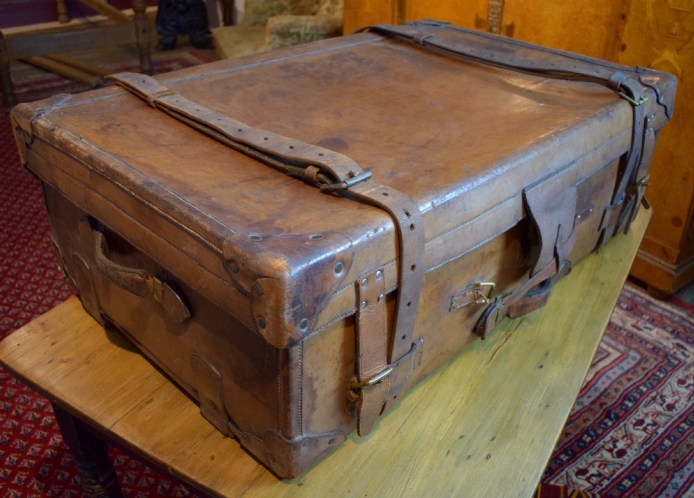 Exceptional Antique large leather suitcase with Chubb lock 