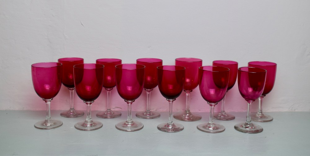 Twelve Victorian Cranberry Ruby Glass Drinking Glasses