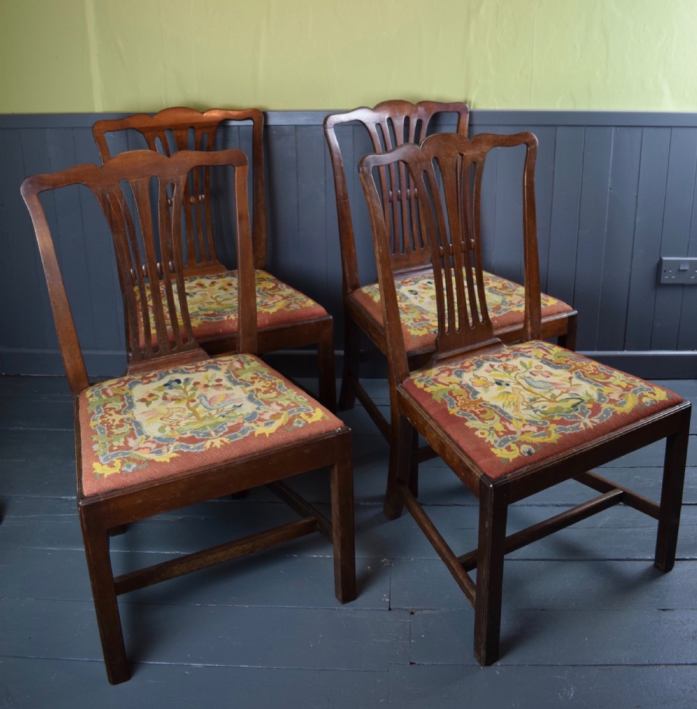 Set of four Georgian mahogany dining chairs with needlework seats View II