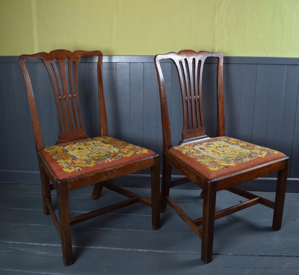 Set of four Georgian mahogany dining chairs with needlework seats View IV