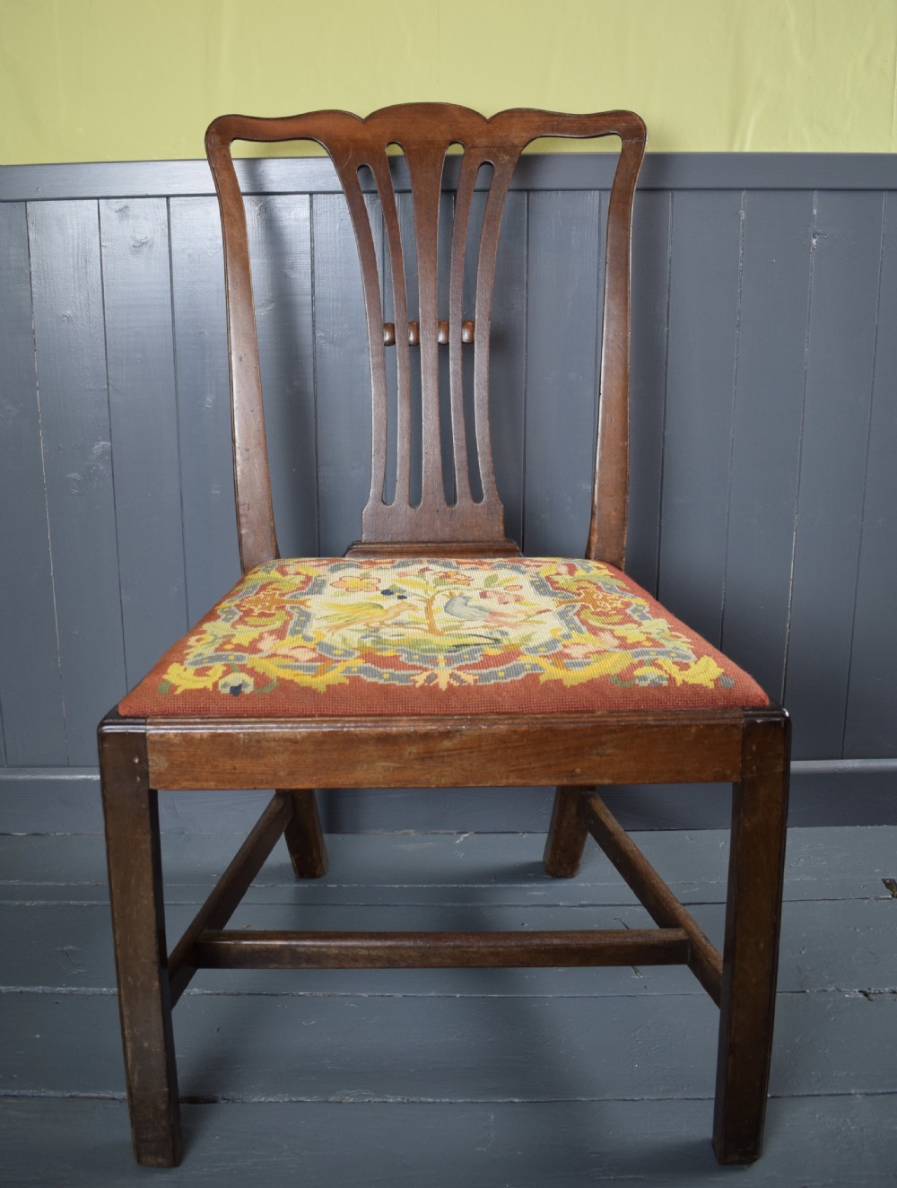 Set of four Georgian mahogany dining chairs with needlework seats View V