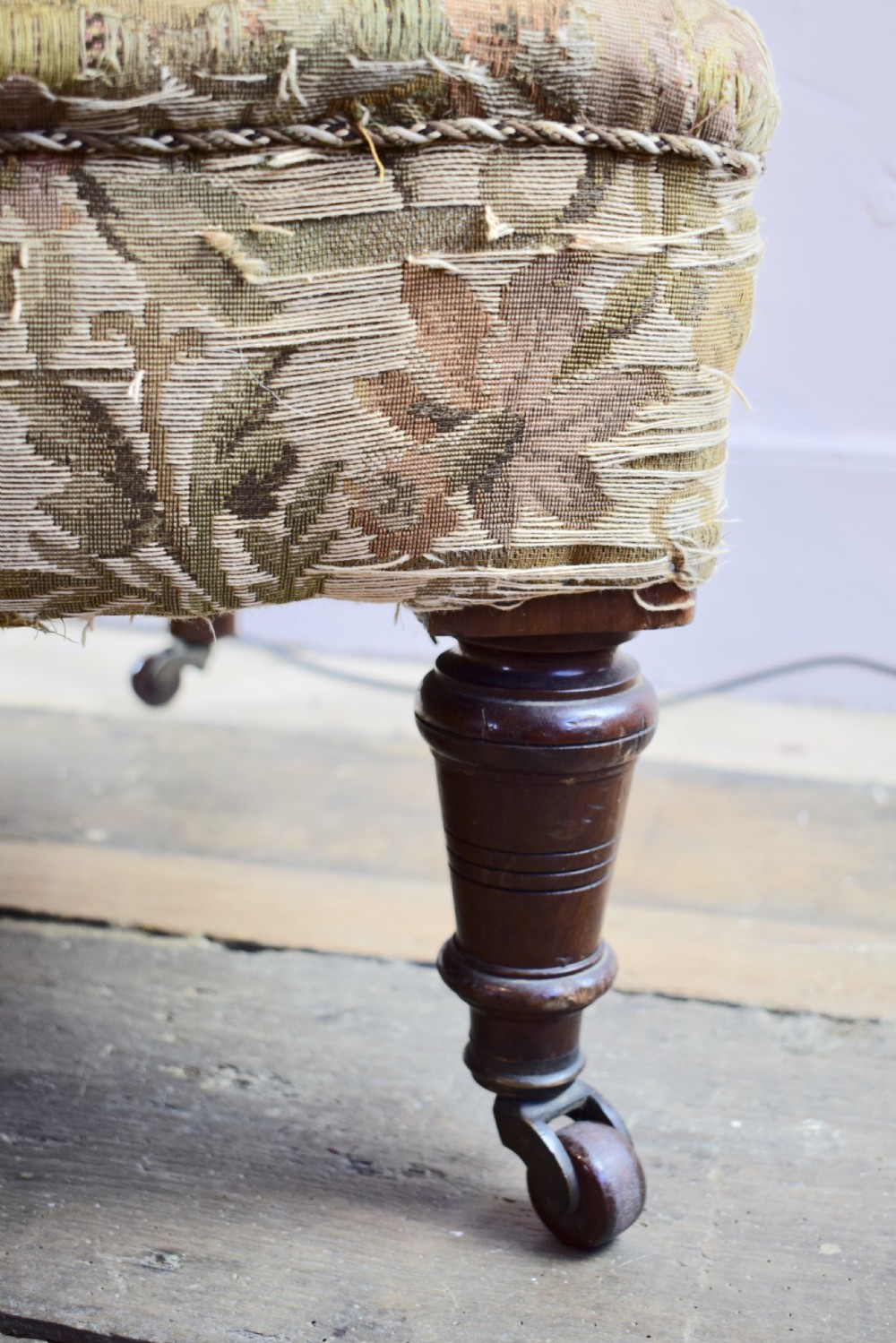 An Antique library armchair with tapestry upholstery View II