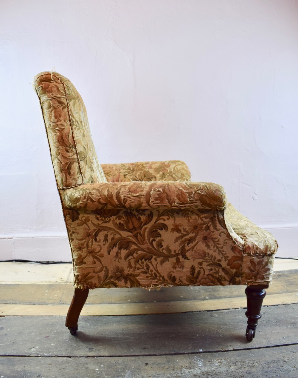 An Antique library armchair with tapestry upholstery View VI