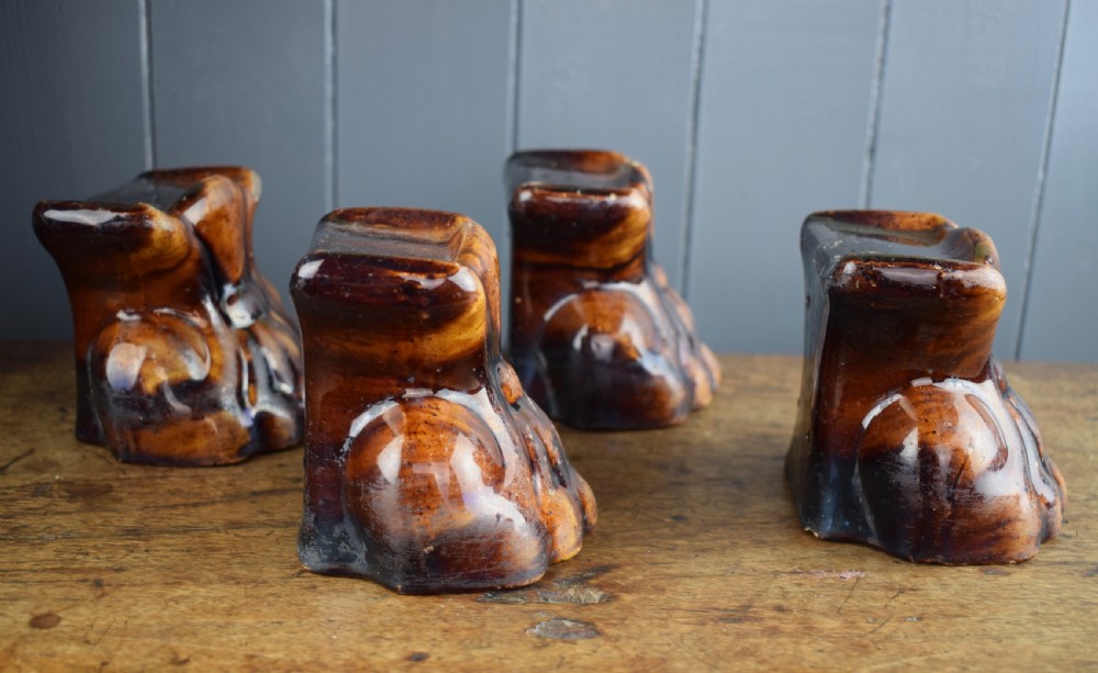 Four Rockingham Treacle Glazed Lion Paw Furniture Supports