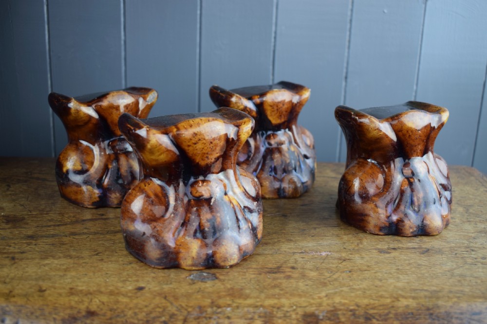 Four Rockingham Treacle Glazed Lion Paw Furniture Supports View II