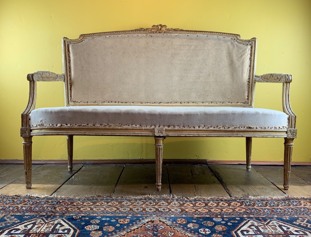 Antique French painted and gilt wood sofa in Louis XVI style View III
