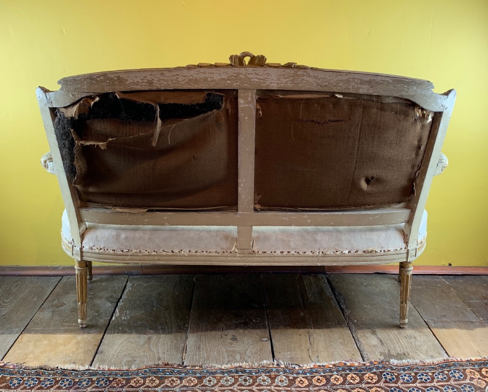 Antique French painted and gilt wood sofa in Louis XVI style View VII