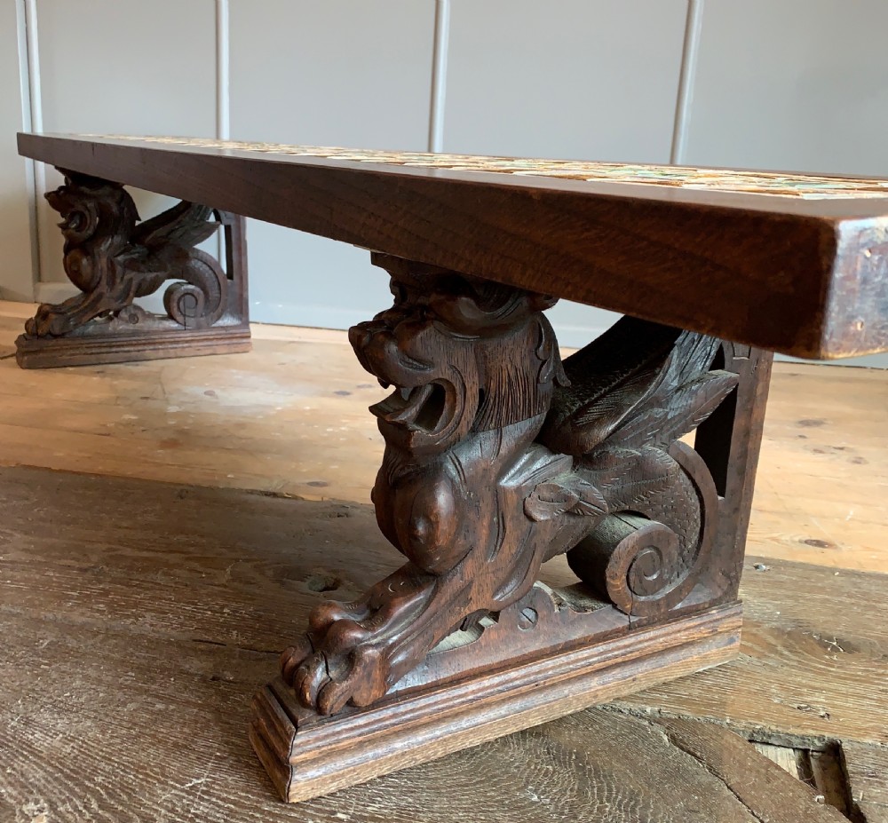 Unusual tile top bench with carved oak griffin supports View IV