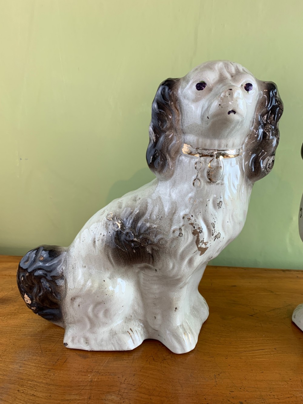 Pair of Victorian black and white Staffordshire pottery dogs. View II