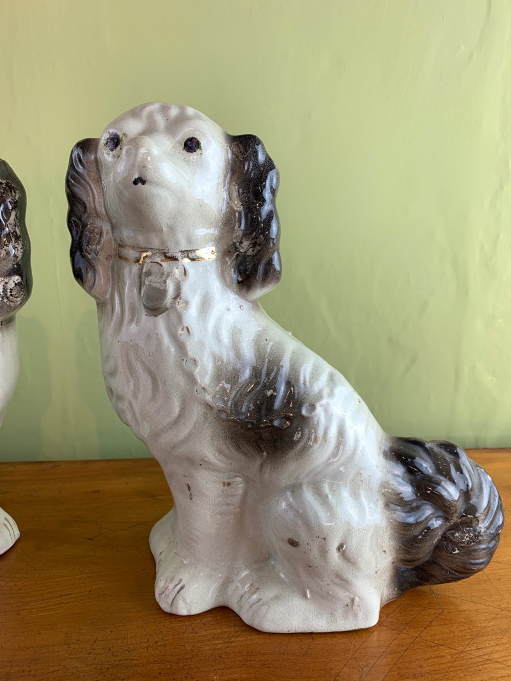 Pair of Victorian black and white Staffordshire pottery dogs. View III
