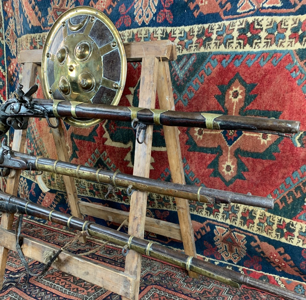 Display of antique Arabian jezail and matchlock guns and an Indian dahl View VII