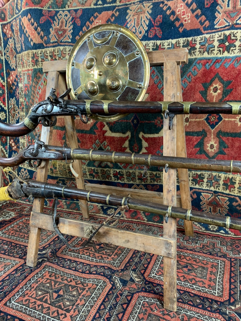 Display of antique Arabian jezail and matchlock guns and an Indian dahl View VIII