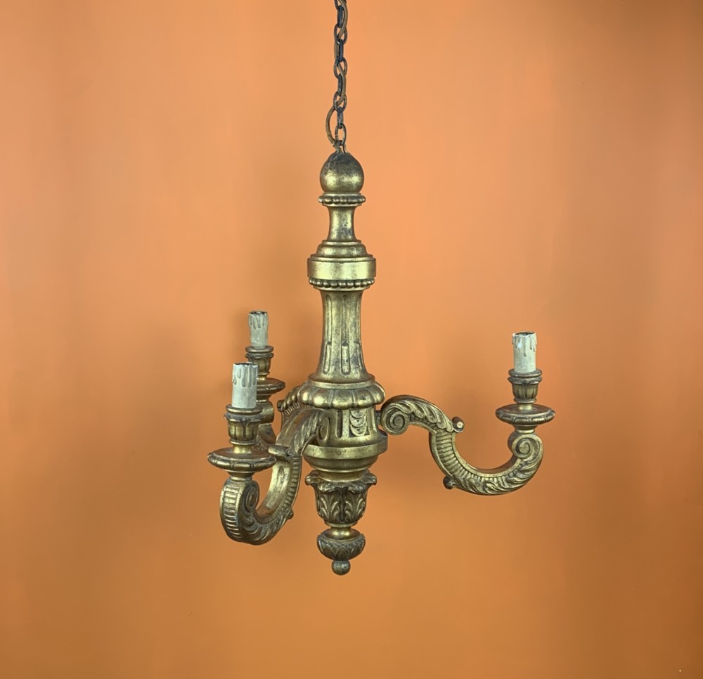 Italian carved gilt wood three branch chandelier