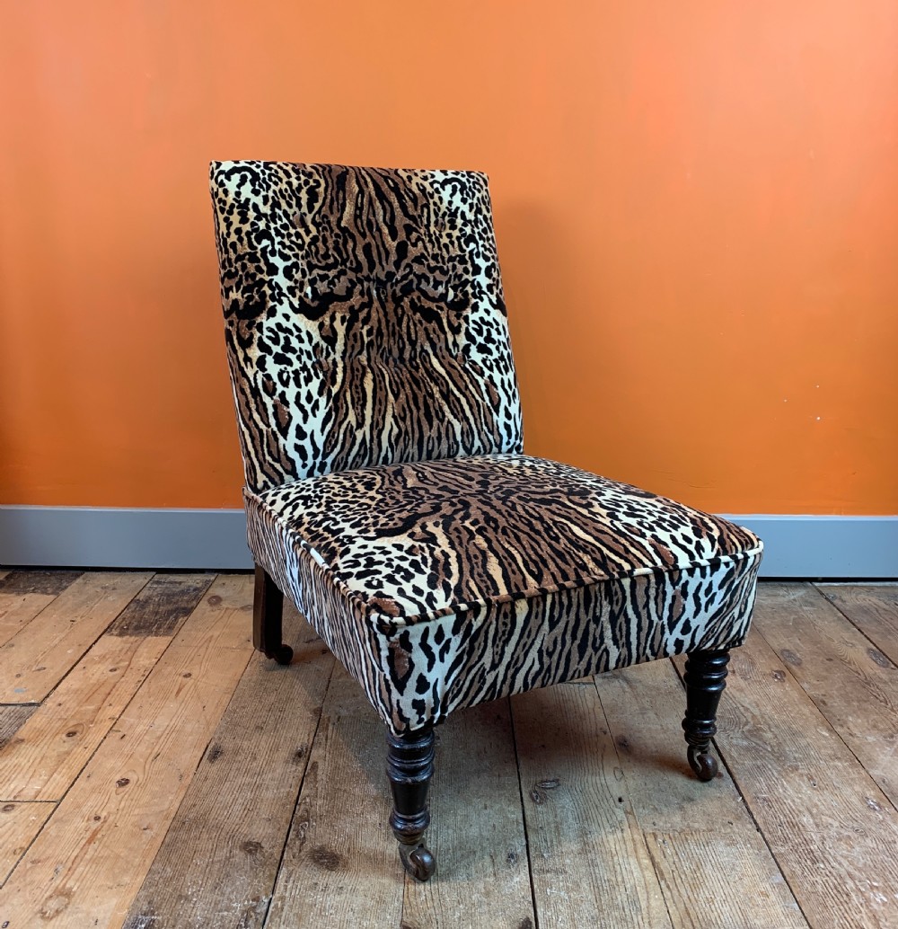 Antique button back occasional chair re-upholstered in leopard print velvet View II