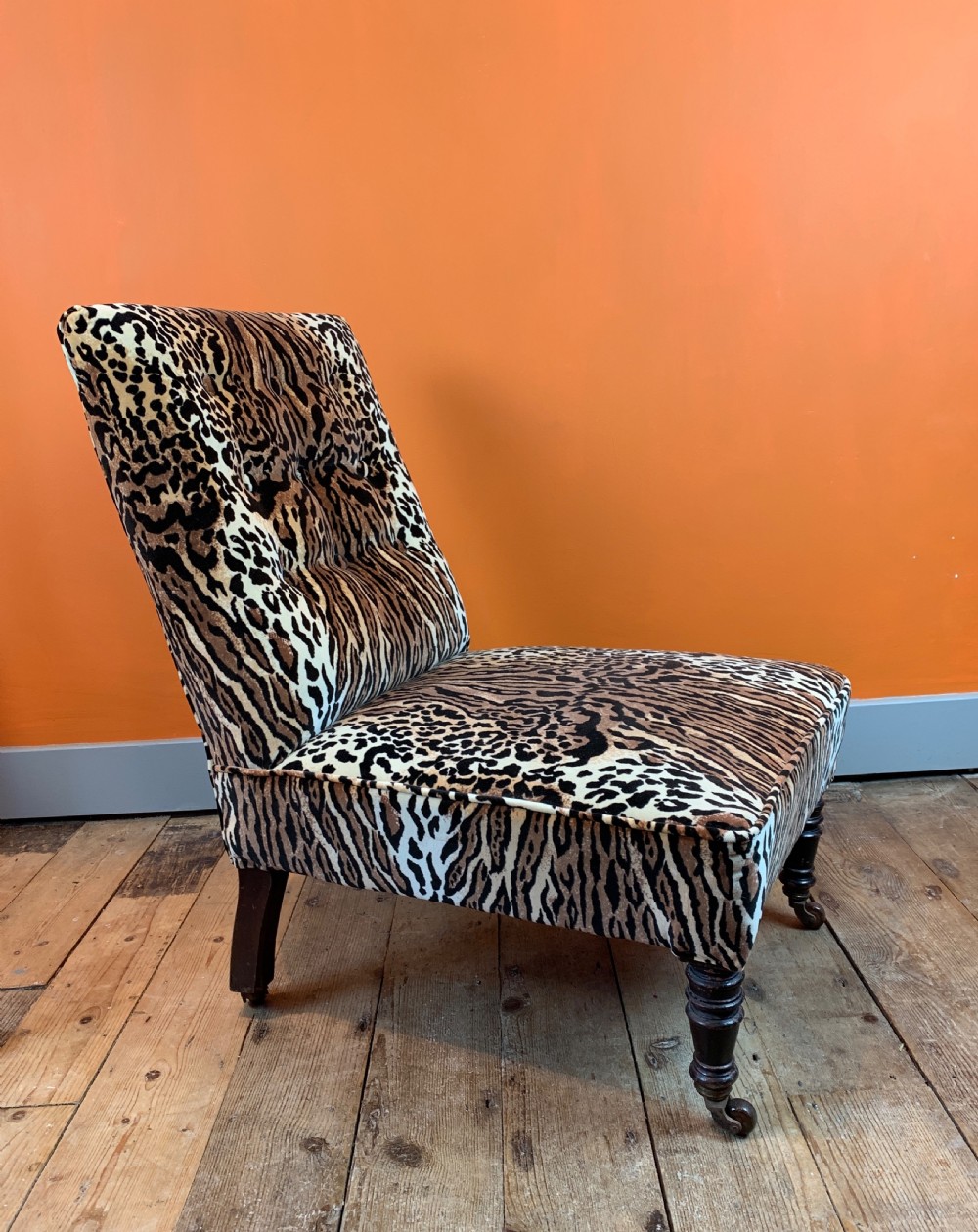Antique button back occasional chair re-upholstered in leopard print velvet View V