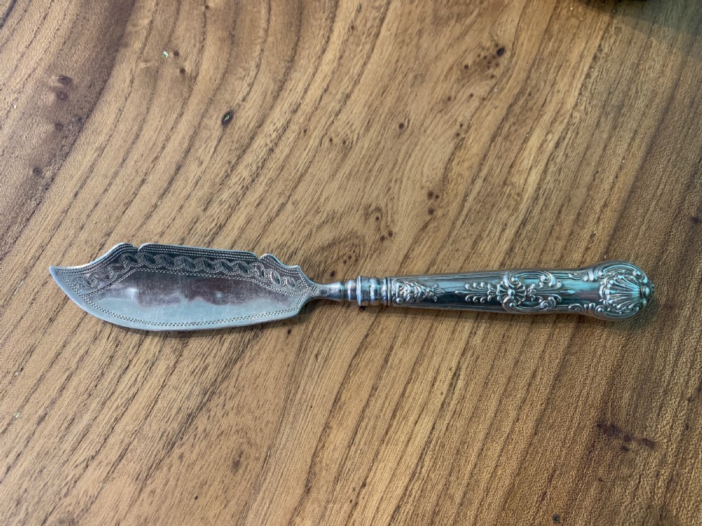 Georgian silver butter knife / curler by John Thornton Birmingham 1826