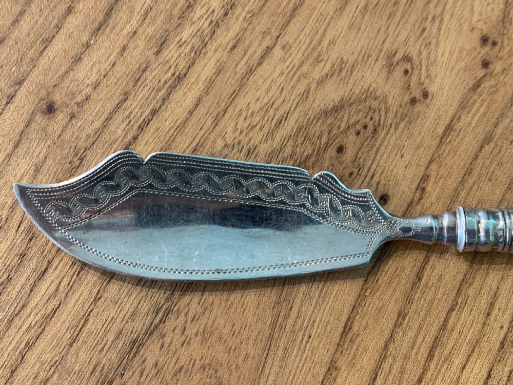 Georgian silver butter knife / curler by John Thornton Birmingham 1826 View V