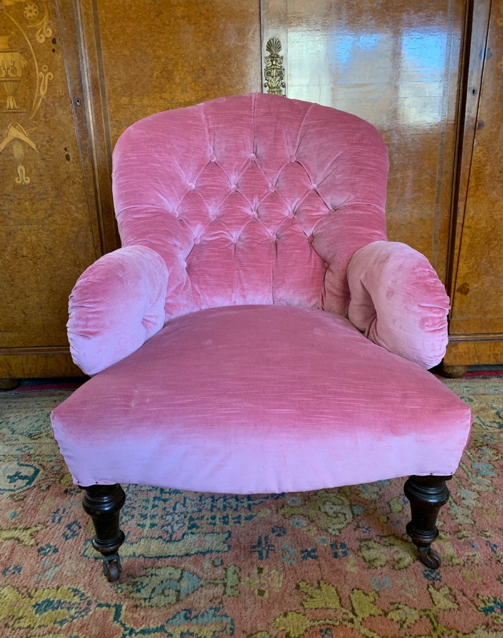 Victorian iron frame button back armchair recently upholstered in pink velvet  View IV
