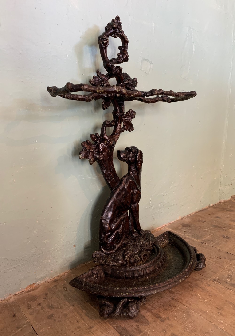 Victorian cast iron stick stand in the form of a dog seated before a tree View II