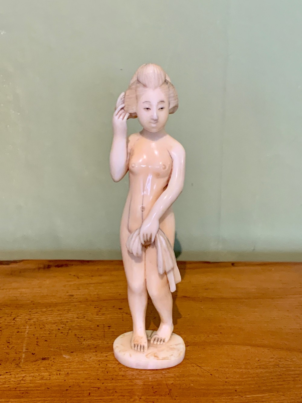 Japanese Meiji carved ivory okimono of a nude girl