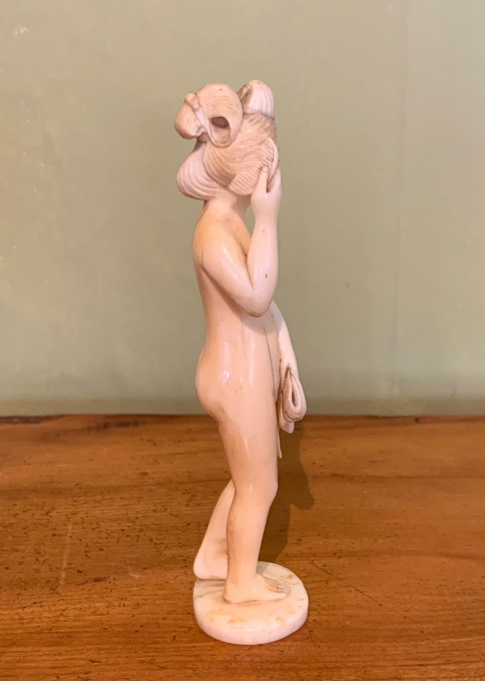 Japanese Meiji carved ivory okimono of a nude girl View III