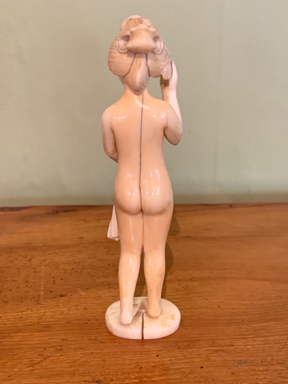 Japanese Meiji carved ivory okimono of a nude girl View IV