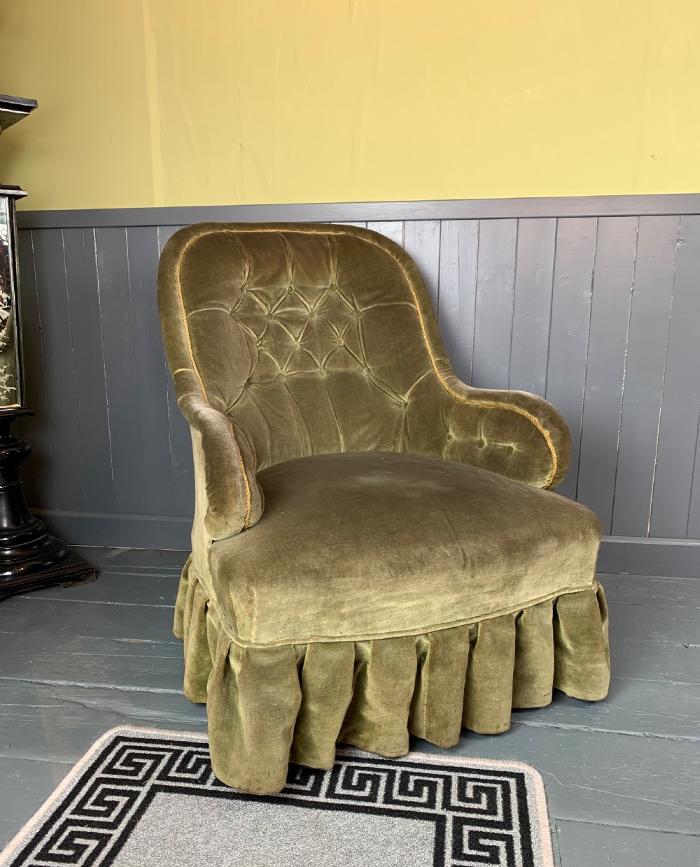 Victorian iron framed button back armchair