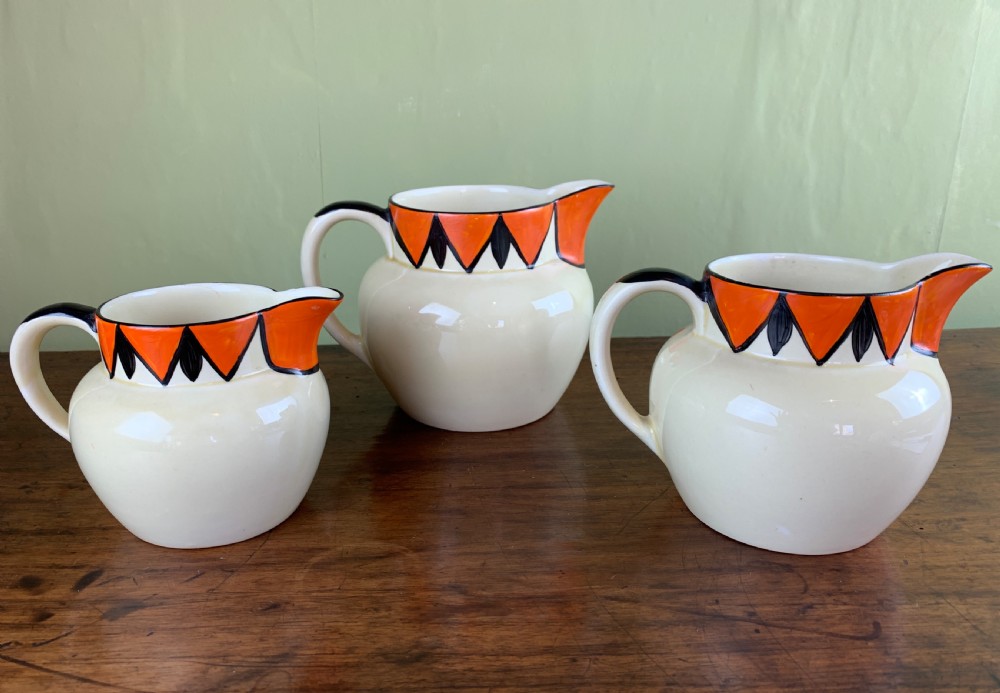 Graduated set of threevMyott & Sons Art Deco hand painted jugs View II