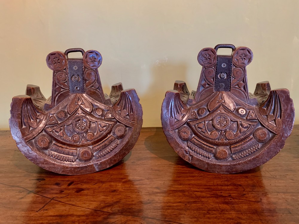 Pair of 19th century Mapuche carved wooden stirrups