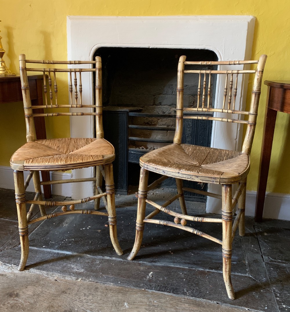 Pair of Regency painted faux bamboo chairs with rush seats View VI