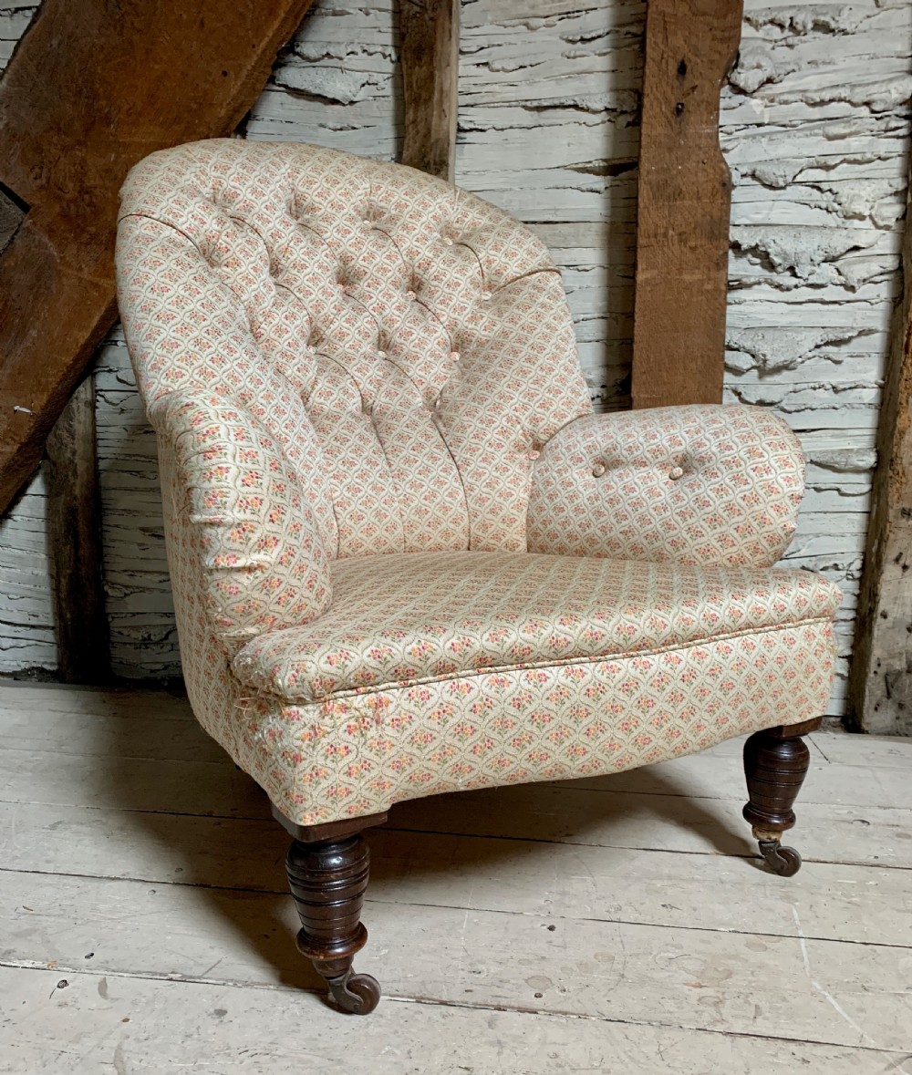 Antique button back armchair of good proportions View II