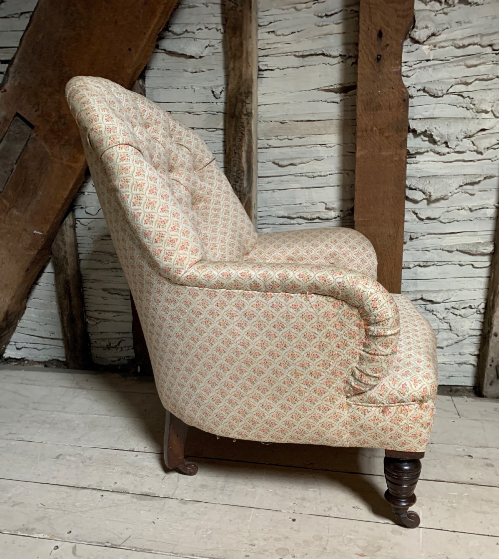 Antique button back armchair of good proportions View V