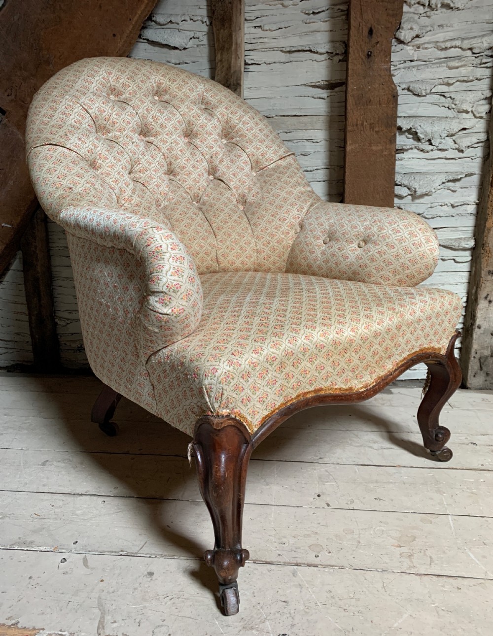 Antique Victorian button back armchair of generous proportions