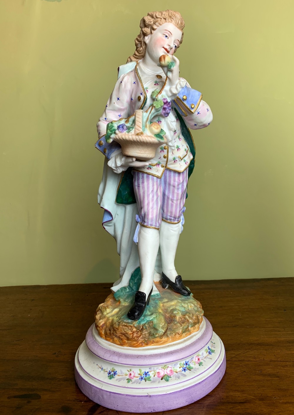 Pair of French bisque porcelain figures with baskets of flowers View III