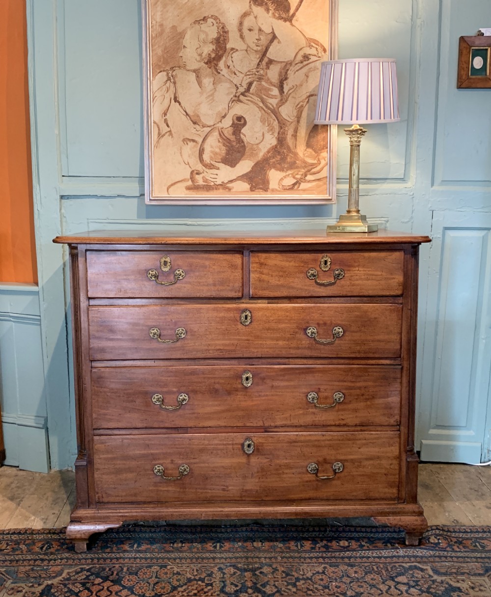 George III mahogany chest of drawers with column corners View II