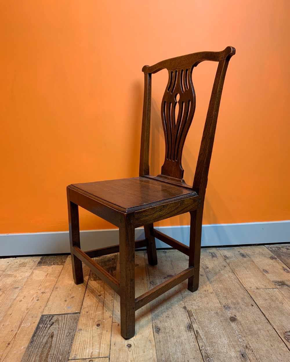 Set of four Georgian provincial oak dining chairs with solid seats View VI