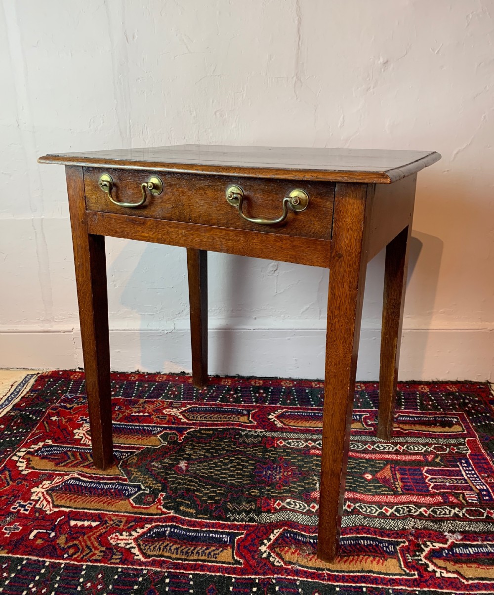 Georgian oak side table with single frieze drawer View II