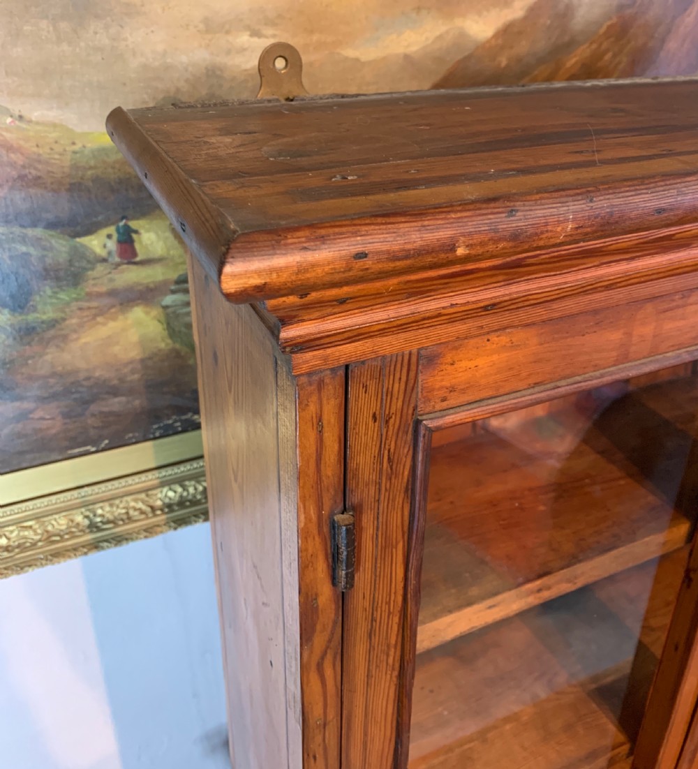 Victorian pitch pine glazed two door wall cabinet View IV