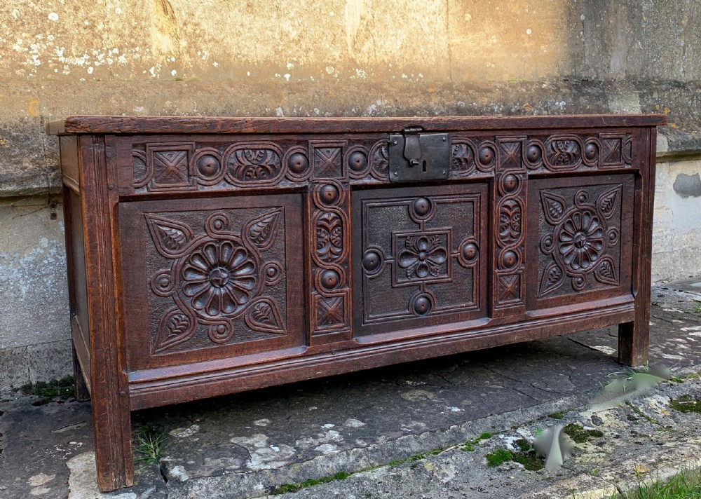 Early 18th century carved oak three panel coffer