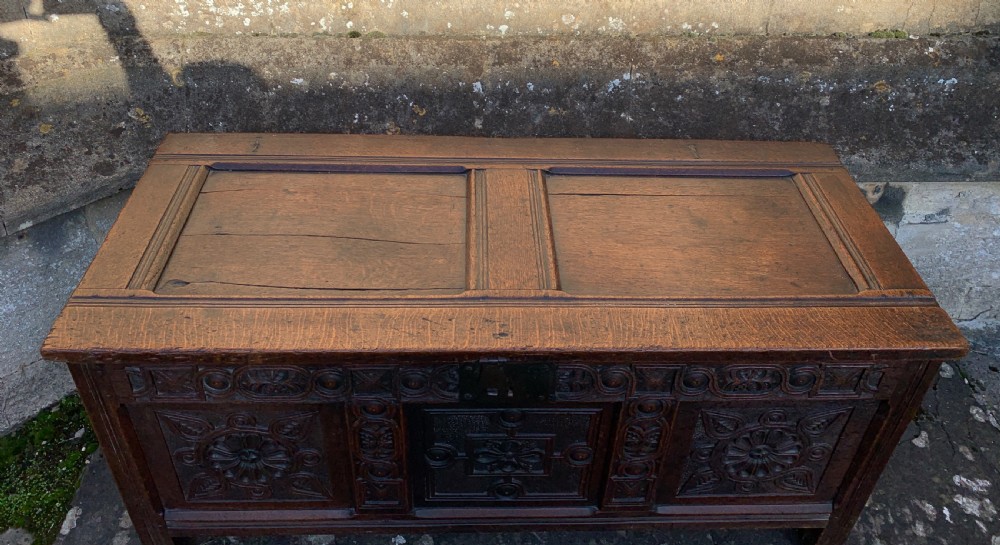Early 18th century carved oak three panel coffer View III