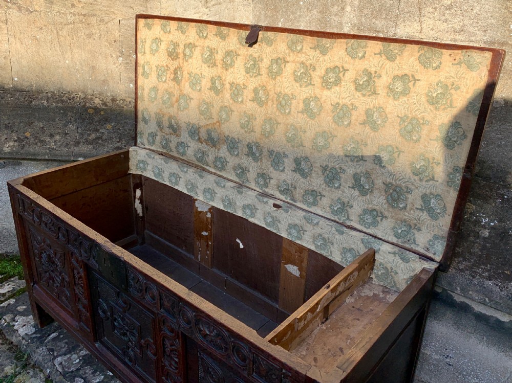 Early 18th century carved oak three panel coffer View V
