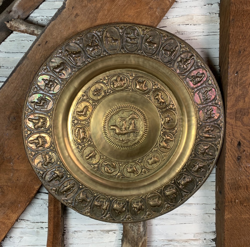 Antique Indian repousse brass Zodiac charger