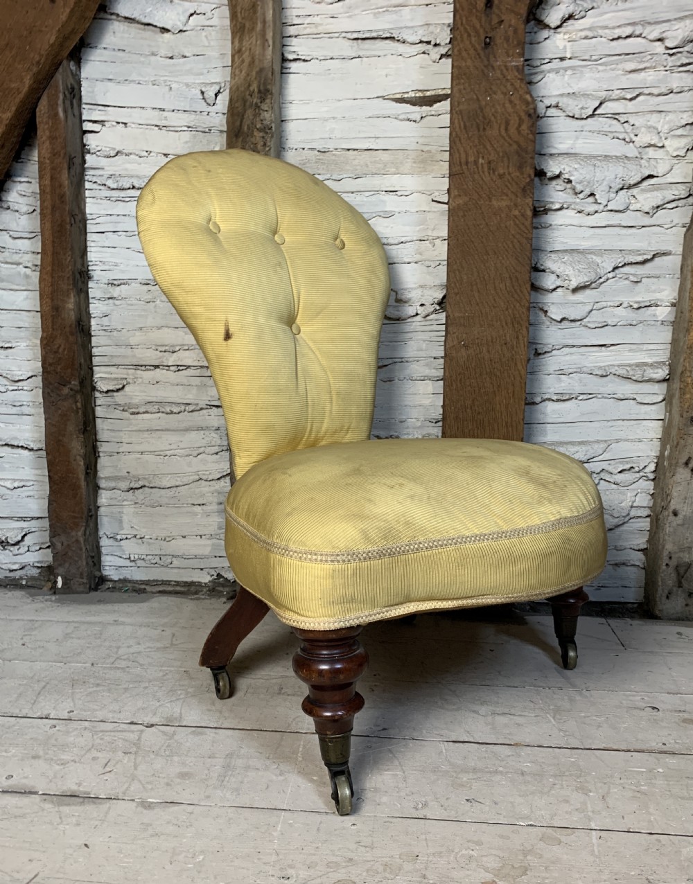 Victorian button back bedroom or occasional chair of unusual shape