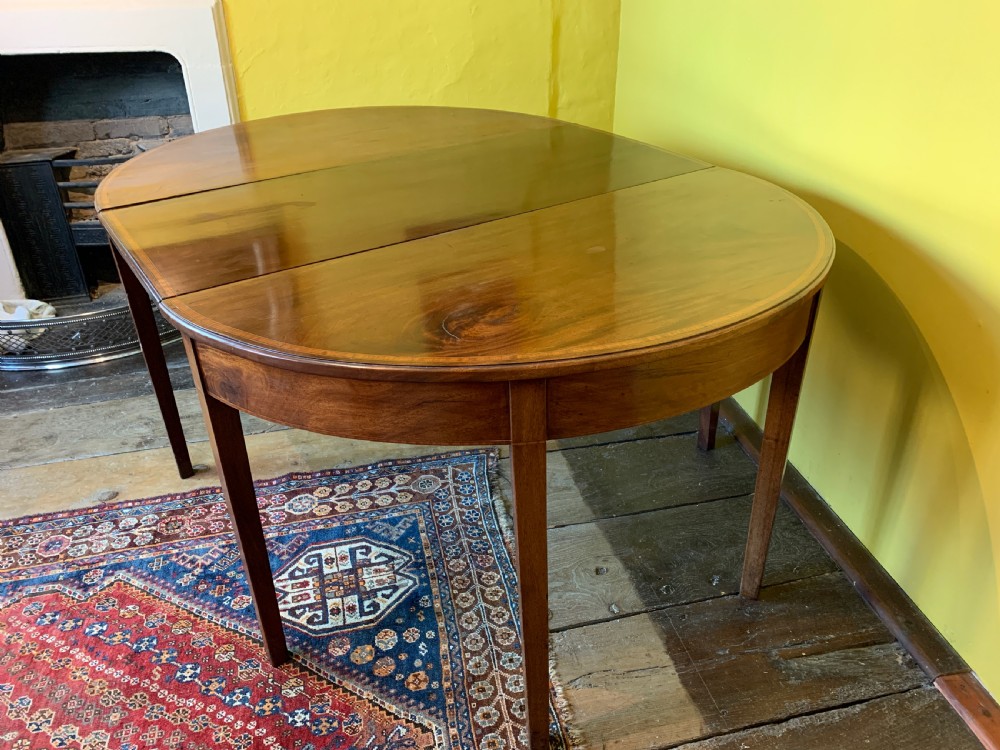 Pair of Georgian mahogany D shape console tables View II