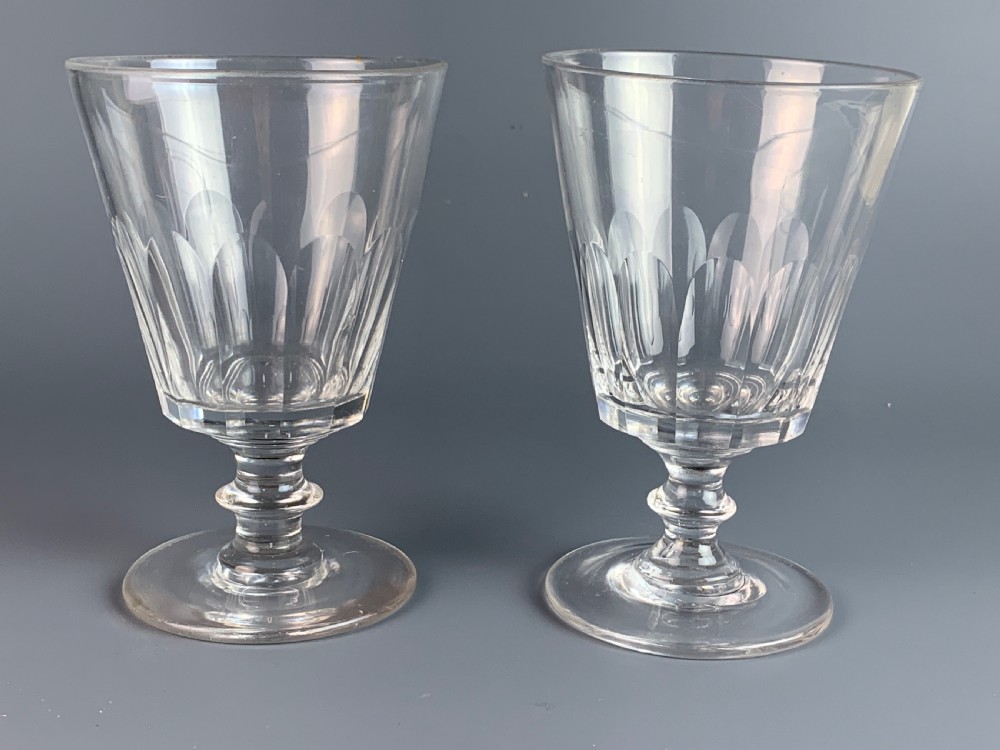 A pair of Regency cut glass rummers wine glasses