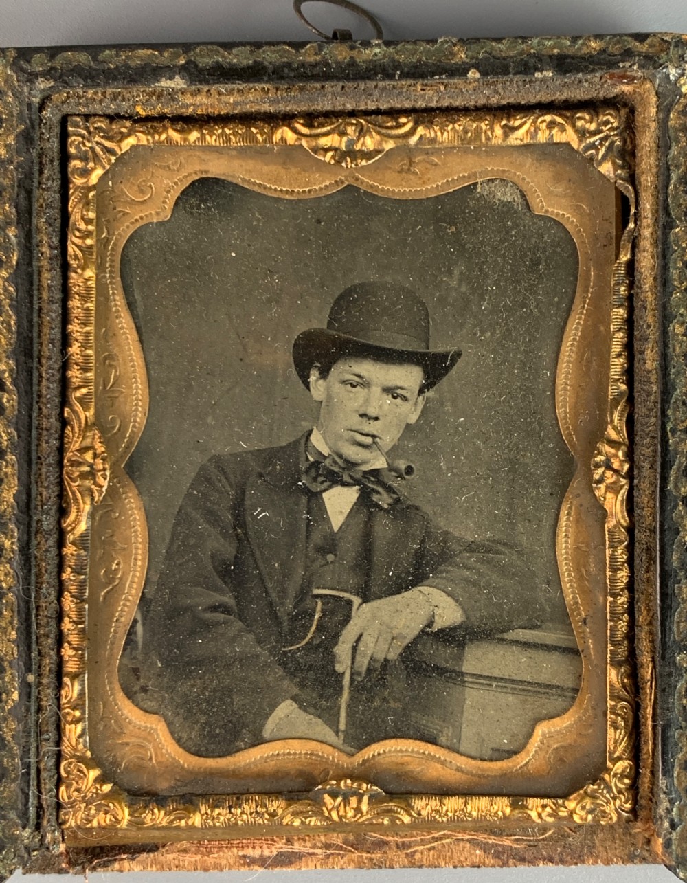 Victorian portrait ambrotype of a man smoking a clay pipe View II
